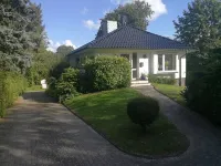 Vacation bungalow with a garden property only 3 minutes away from the beach Hotel a Scharbeutz