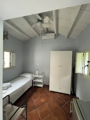 Dependance in Villa 7 km from Cefalù near the sea with garden and services.
