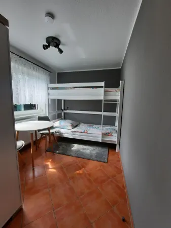 near the dyke (30m) and green beach, sea water swimming pool