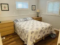 NEWLY RENOVATED! Large sandy beach & swim area. Cute 3 bedroom lake house