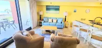 Beach Condo with King Bed, private beach, and heated pool