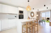 APARTMENT A few meters from a black sand beach.