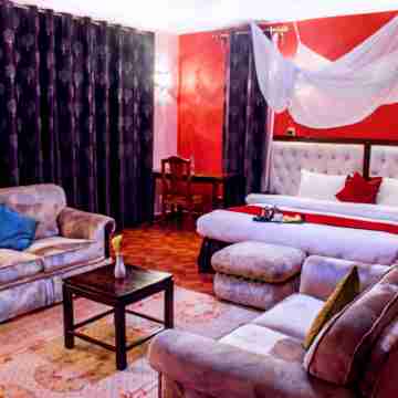 Karen Inn & Suites Rooms