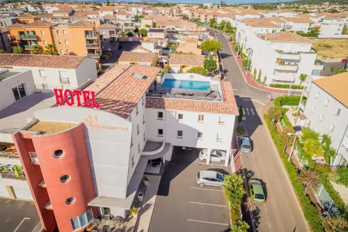 Hotel Grand Cap Rooftop Pool Hotels in Bessan