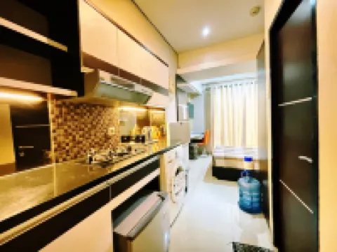 Studio 18 Apartemen the Jarrdin Cihampelas by Berdikari Properti