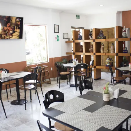 Estanza Hotel & Suites