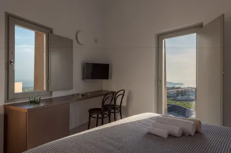 Albus Villas Отели рядом с достопримечательностью «Black Rock Studios»