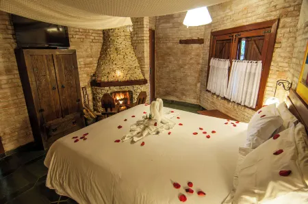 Pousada Cantinho Das Estrelas Отели рядом с достопримечательностью «Escola Mineira de Falcoaria»