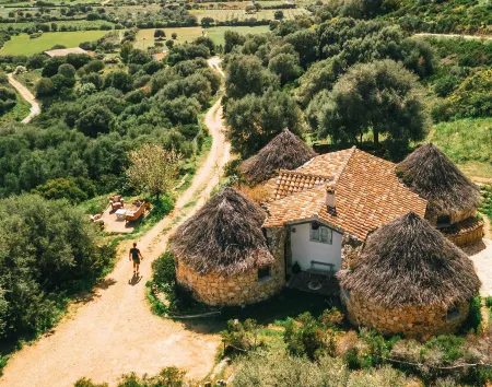 Essenza Sardegna Отели в г. Торпе