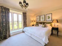 Parc-Le-Breos House Hoteles en Ilston