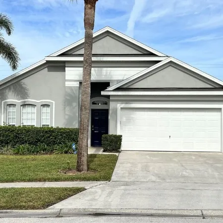 Lovely home near Disney with a Heated pool and game room in a resort community.