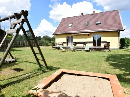 Holiday Home by Lake with Boat in Poland, Cleaning Included