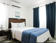 Beautiful condo in La romana, DR with pool and walking distance to Caleta beach.