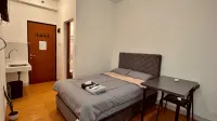 RoomQu @ Ecohome Citra Raya Hôtels à : Sindang Jaya