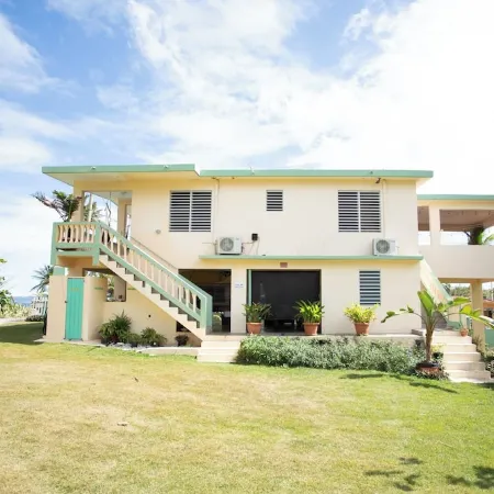 PELICAN REEF BEACHFRONT 2 BED 1 BATH A/C ON SMALL FARM, SURF RIGHT OUT FRONT