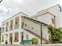 Alcazar Suites Hotels near BIBLIOTECA SAN JUAN DE OCOTAN
