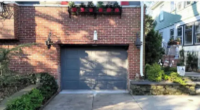 Live in this iconic East Side lower level apartment