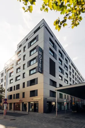 Harry's Home Villach Hotel & Apartments Отели рядом с достопримечательностью «Villach-St. Jakob»