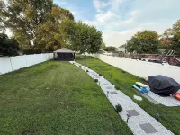 Close to everything! Well equipped, beautiful backyard and near the beach. Hotels near Promenade Beach Club