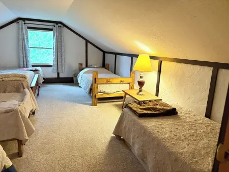 Welcoming lake house with five bedrooms and a huge deck on Tee lake in Lewiston.