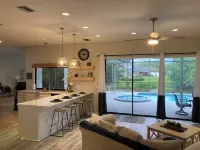 Large Pool/Spa Home Minutes from Beach with Arcade Games and Canal for Fishing.