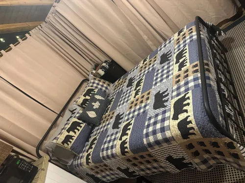 Mentone glamping getaway in a  private screened in cabin in charming Mentone