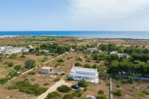 LiAMA Detached villa surrounded by greenery with panoramic sea views.
