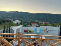 Charming 2-bedroom bungalow with WiFi, AC in serene Qechresh Hotels in Guba