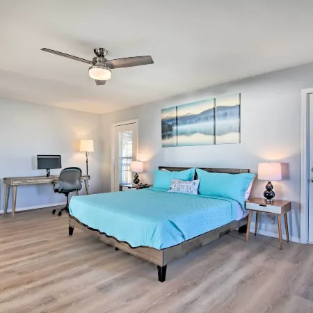 Sunny Lakefront Escape w/ Private Beach & Deck