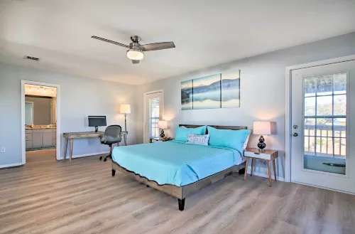 Sunny Lakefront Escape w/ Private Beach & Deck - parkir