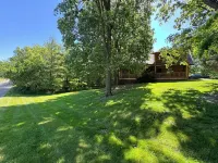 Gorgeous XL Log Cabin in Bloomington, IL! 2 Game Rooms + Hot Tub & Sauna!