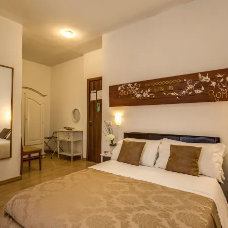 Trastevere Rooms Отели рядом с достопримечательностью «Базилика Санта-Приска»