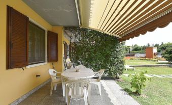 Apartment with One Bedroom in Pacengo, with Shared Pool, Furnished Terrace and Wifi - Near the Beach