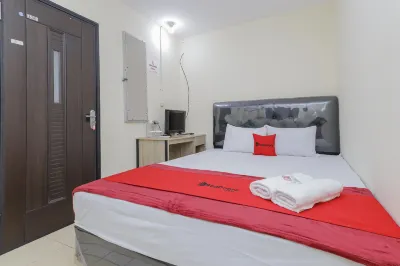 RedDoorz near RS Sari Asih Ciledug Hotel dekat Taman Pintu Kampung Blok DD Palm Ganda Asri 2