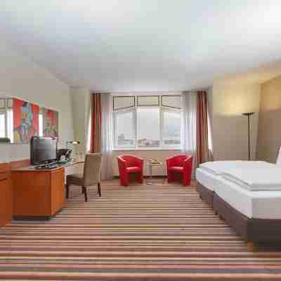 H+ Hotel Leipzig Rooms