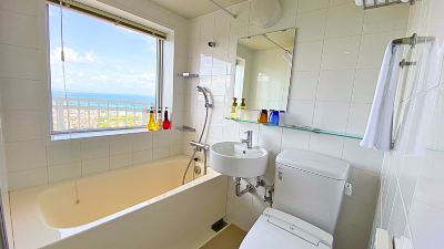 洋室デラックスルーム オーシャンビュー別館 ユインチホテル南城の写真