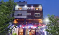 Treebo Three Street Inn Hotel dekat BGS School of Architecture and Planning