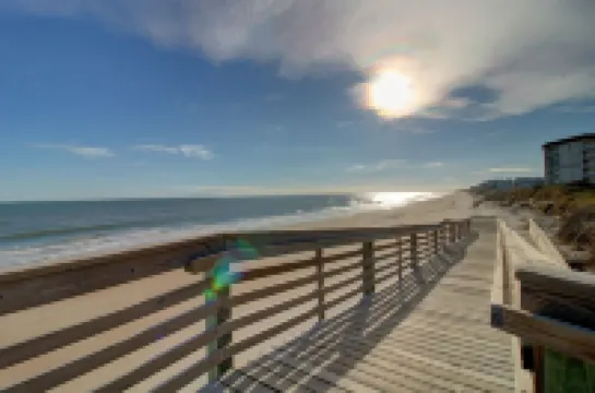 Beautiful condo with personal balcony in our oceanfront complex .