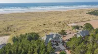 CORAL SUNSETS & SHIMMERING DEEP BLUE OCEAN VIEWS..  LASTING MEMORIES MADE HERE!!