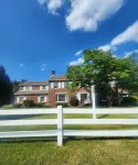 Modern apartment in historic estate on picturesque property. Centrally located.