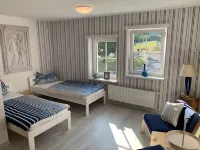 Apartment in top location with sauna and rooftop lounge for families and active vacation groups Hotels in Grossschonau