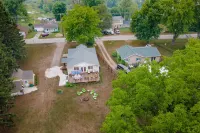Lake front home with access to two lakes, large yard and RV hookup available!