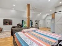 Studio above a detached garage away from main house on a private lot.