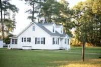 Mid-century modern meets classic cape on the coast. - 3-Star