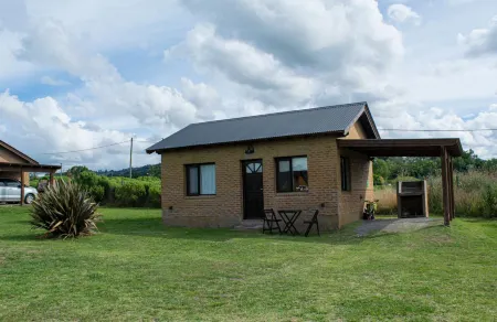 Cabañas Colinas Serranas Отели в г. Тандиль