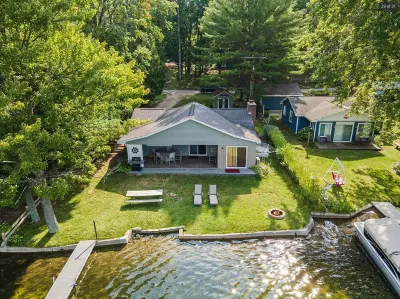 Quiet oasis steps from the water with access to Canadian Lakes amenities! Hotels near Four Mile Beach Park