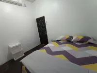 Penginapan Violet Doorz Syariah Hotel a Komet