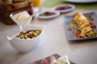 Afroessa Hotel by Caldera Houses - breakfast