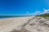 Balcony with Ocean Views and Modern Amenities - Charming Coastal Retreat