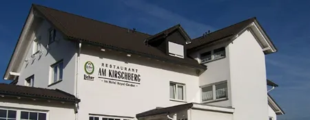 Hotel am Kirschberg Отели в г. Грюнберг
